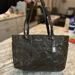 Large Gray Patent  Leather Coach shoulder bag.